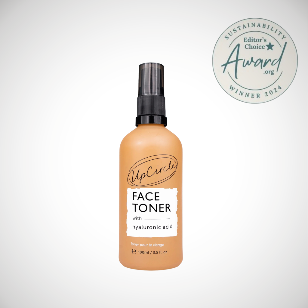 Award winning face toner with hyaluronic acid and BHA salicylic in brown glass bottle and pump cap. Cruelty free, vegan, upcycled ingredients