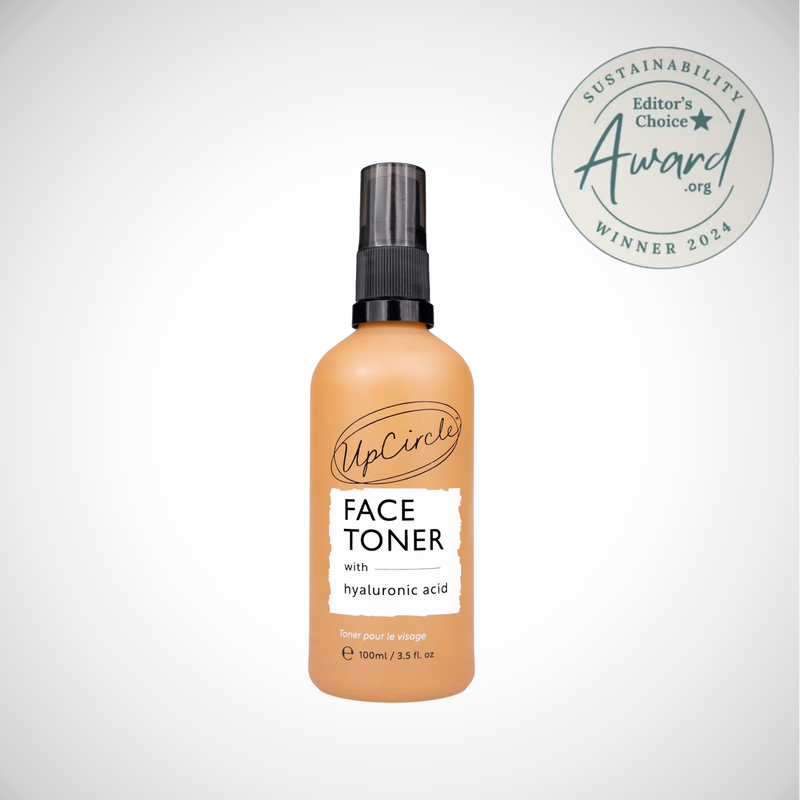 Award winning face toner with hyaluronic acid and BHA salicylic in brown glass bottle and pump cap. Cruelty free, vegan, upcycled ingredients