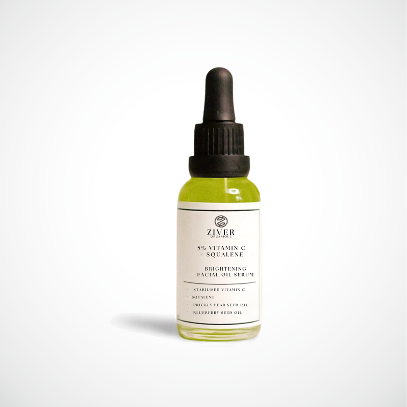 Glass bottle with dropper cap with Vitamin C and squalane yellow liquid in the bottle.
