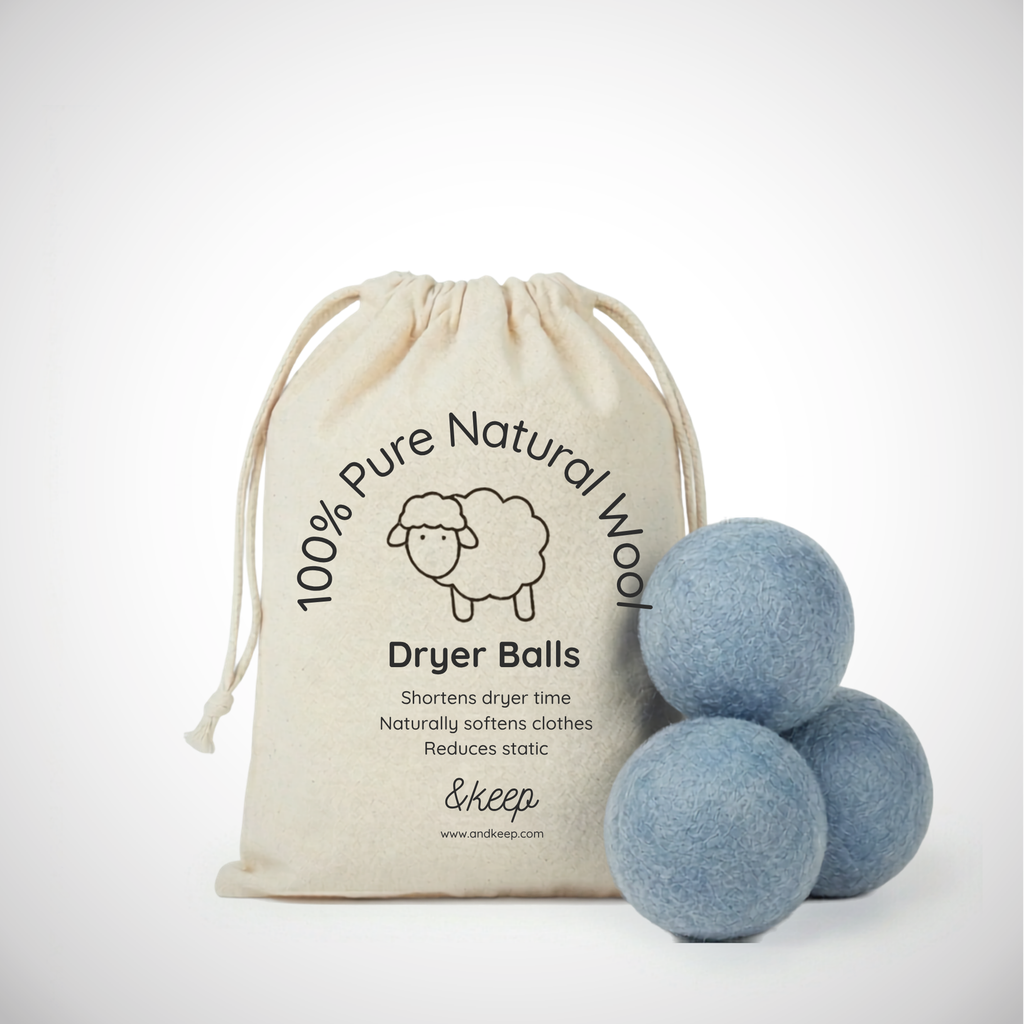 Set of 3 blue wool dryer balls with a cloth bag. Shortens dryer time and naturally softens clothes. Reduces static.