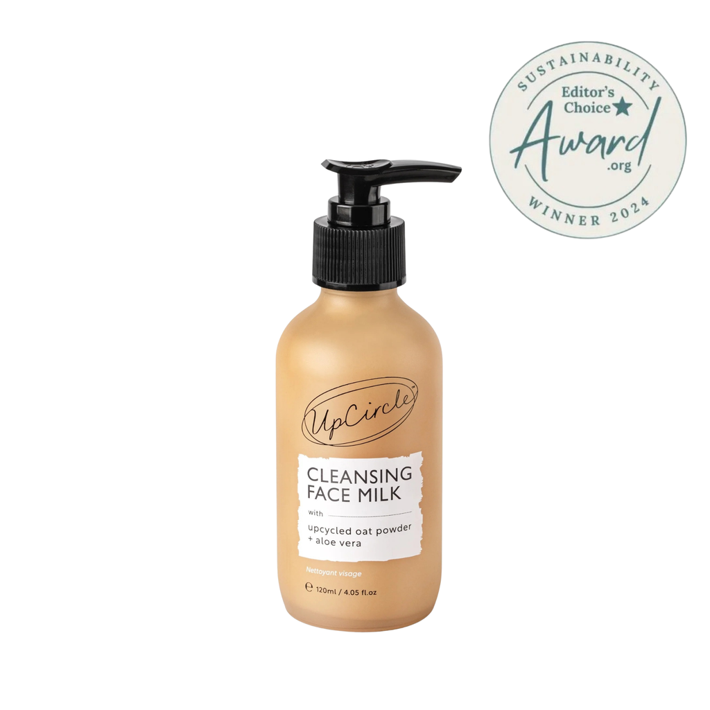 A bottle of UpCircle Cleansing Face Milk with a black pump dispenser, shown on a white background with a circular Editor's Choice Award 2024 badge in the top right corner.